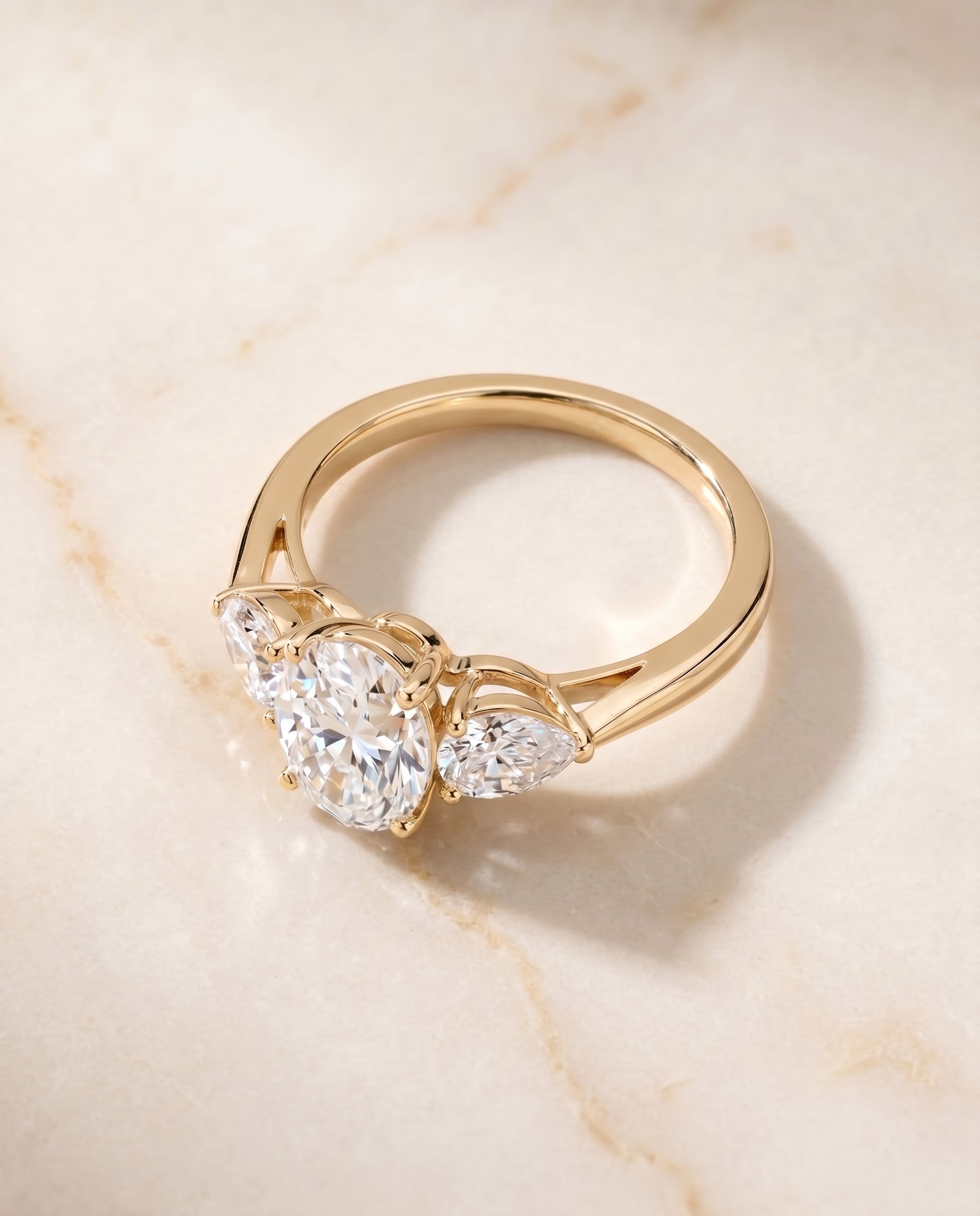 Three Stone Matched styling on The Angelica oval engagement ring setting | RockHer