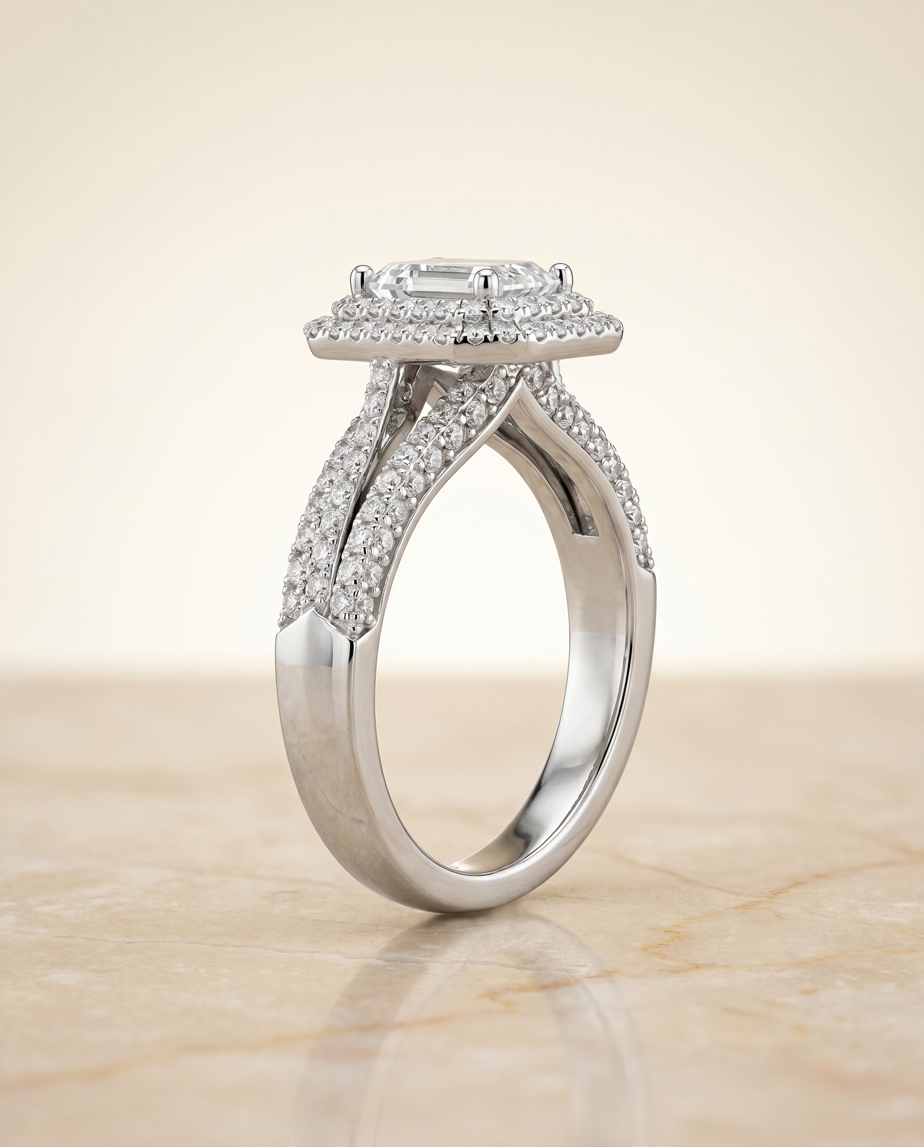 Three Tier Halo Crown Cut styling on The Mariah emerald engagement ring setting | RockHer