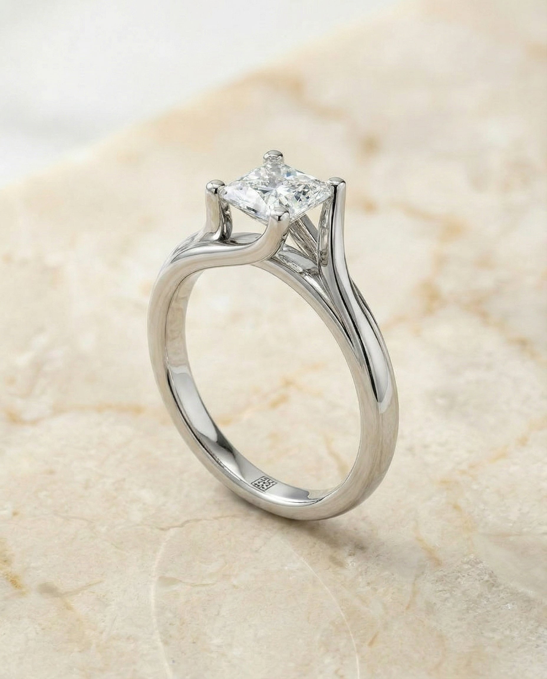 Twisted Bypass Solitaire styling on The Joplin princess engagement ring setting | RockHer