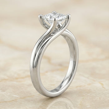 The Joplin Twisted Bypass Solitaire Princess Cut Engagement Ring Setting in 18K White Gold