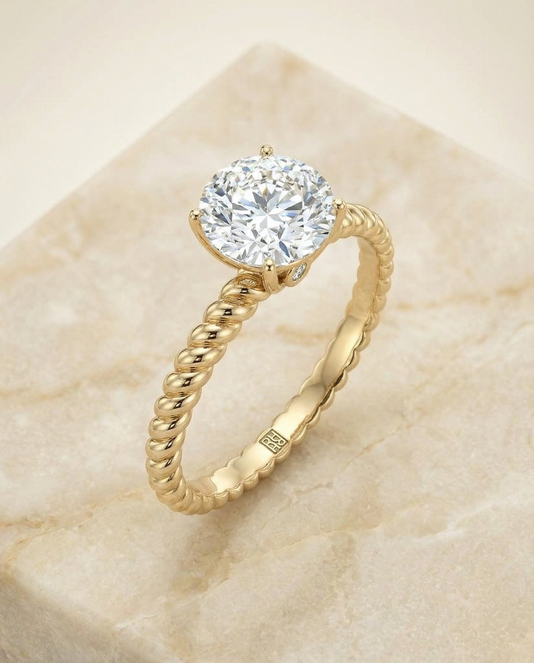 The Charlie twisted rope surprise diamond solitaire engagement ring setting, shown in 18K Yellow Gold | RockHer