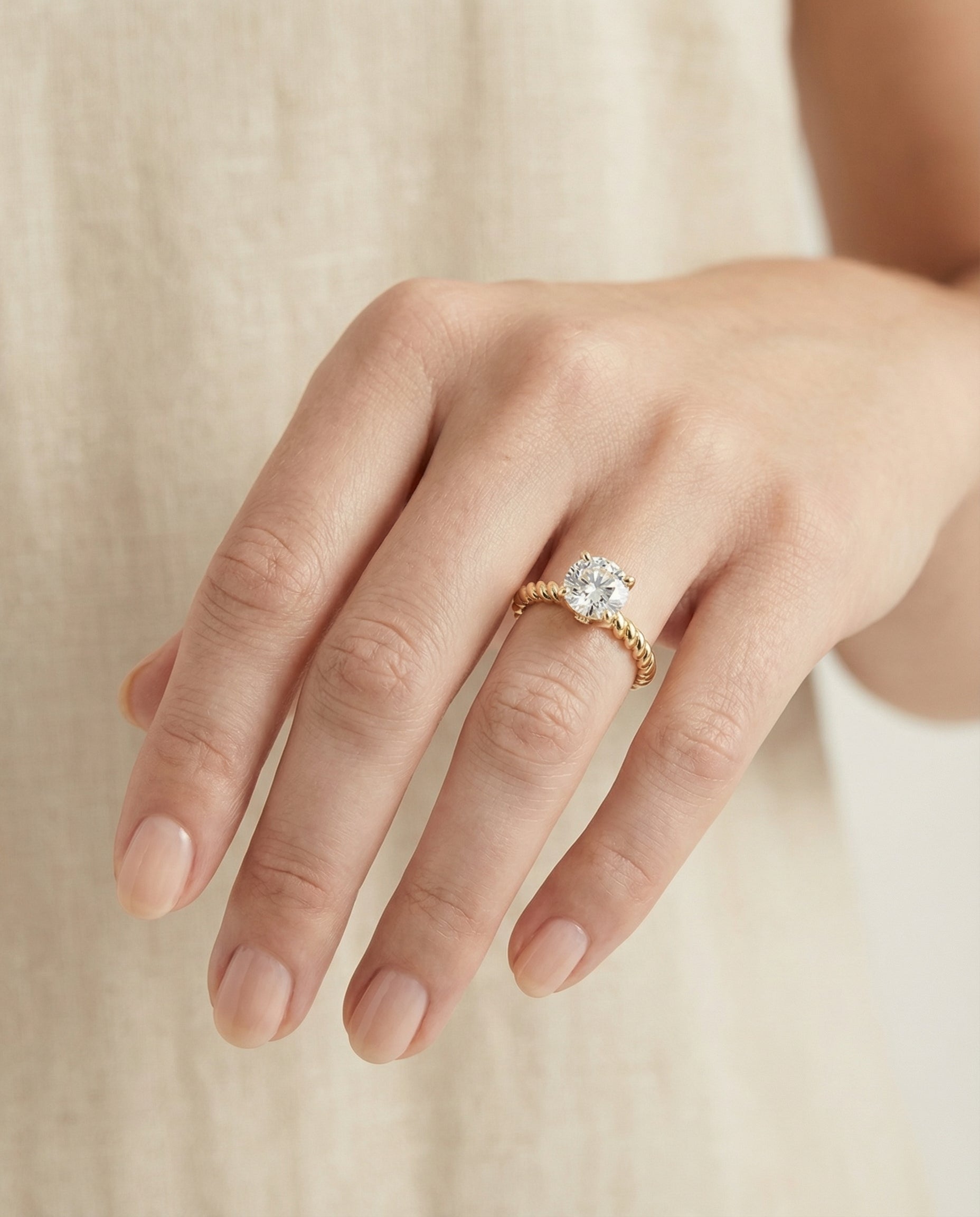 The Charlie engagement ring setting in 18K Yellow Gold, twisted rope surprise diamond solitaire design | RockHer