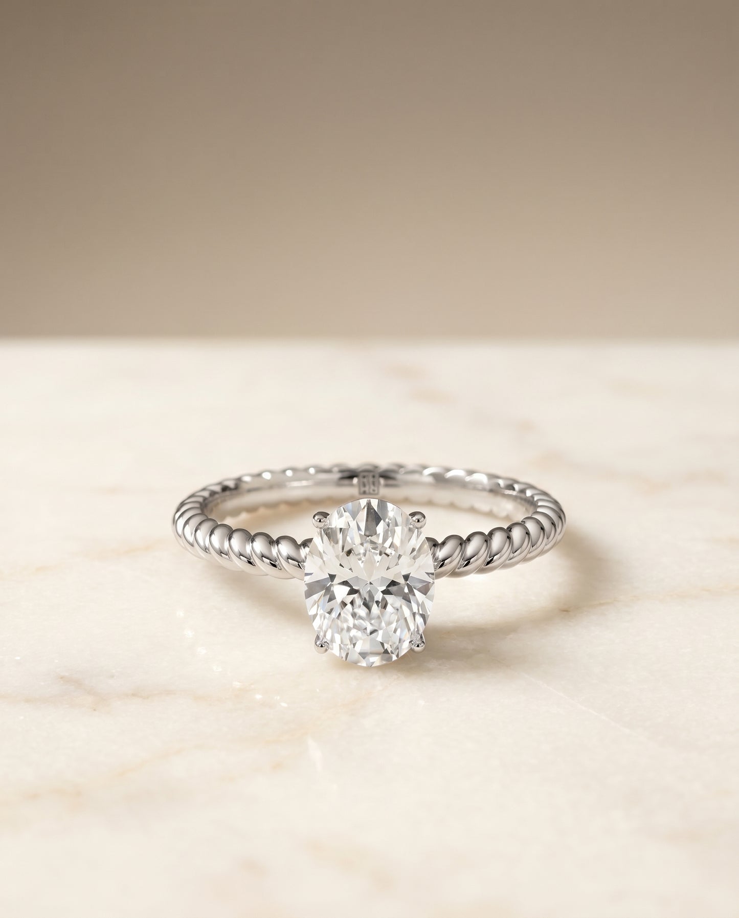 Oval, Twisted Rope Surprise Stone Solitaire, in 18K White Gold – angled view | RockHer