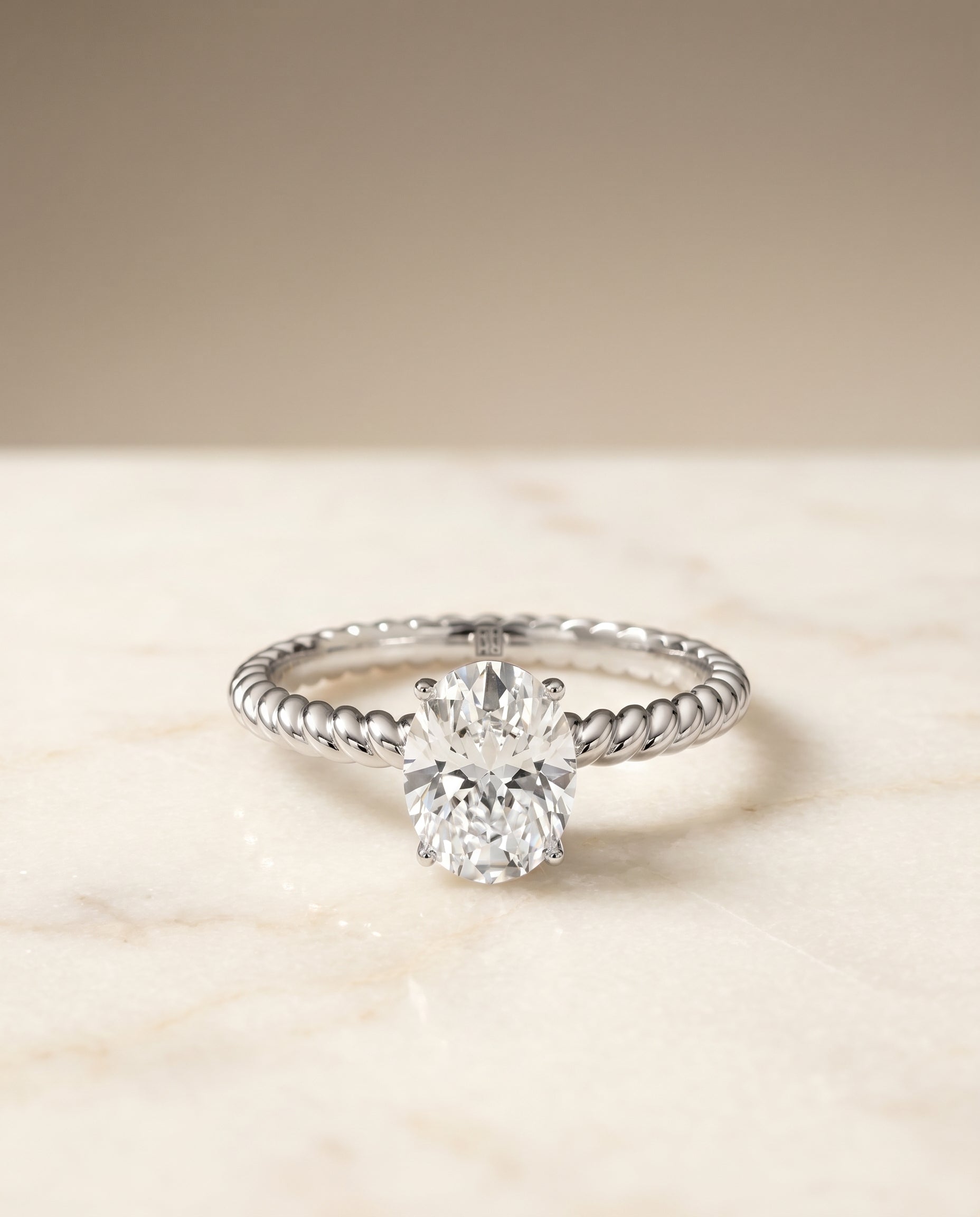 Twisted Rope Surprise Stone Solitaire Oval, in Platinum – angled view | RockHer