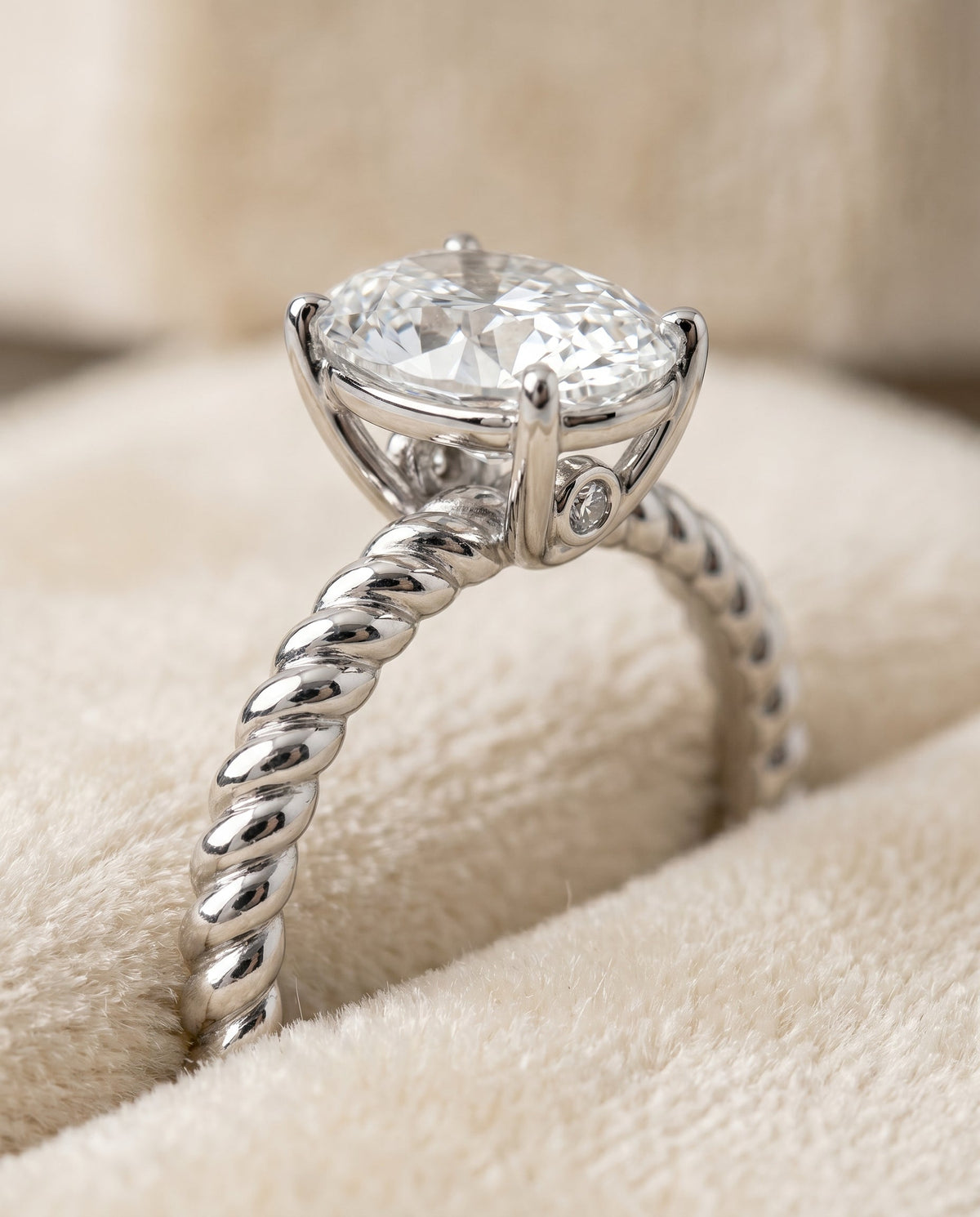 Charlie Select Twisted Rope Surprise Stone Solitaire Ov Oval Lab Diamond Engagement Ring in Platinum, detail view | RockHer