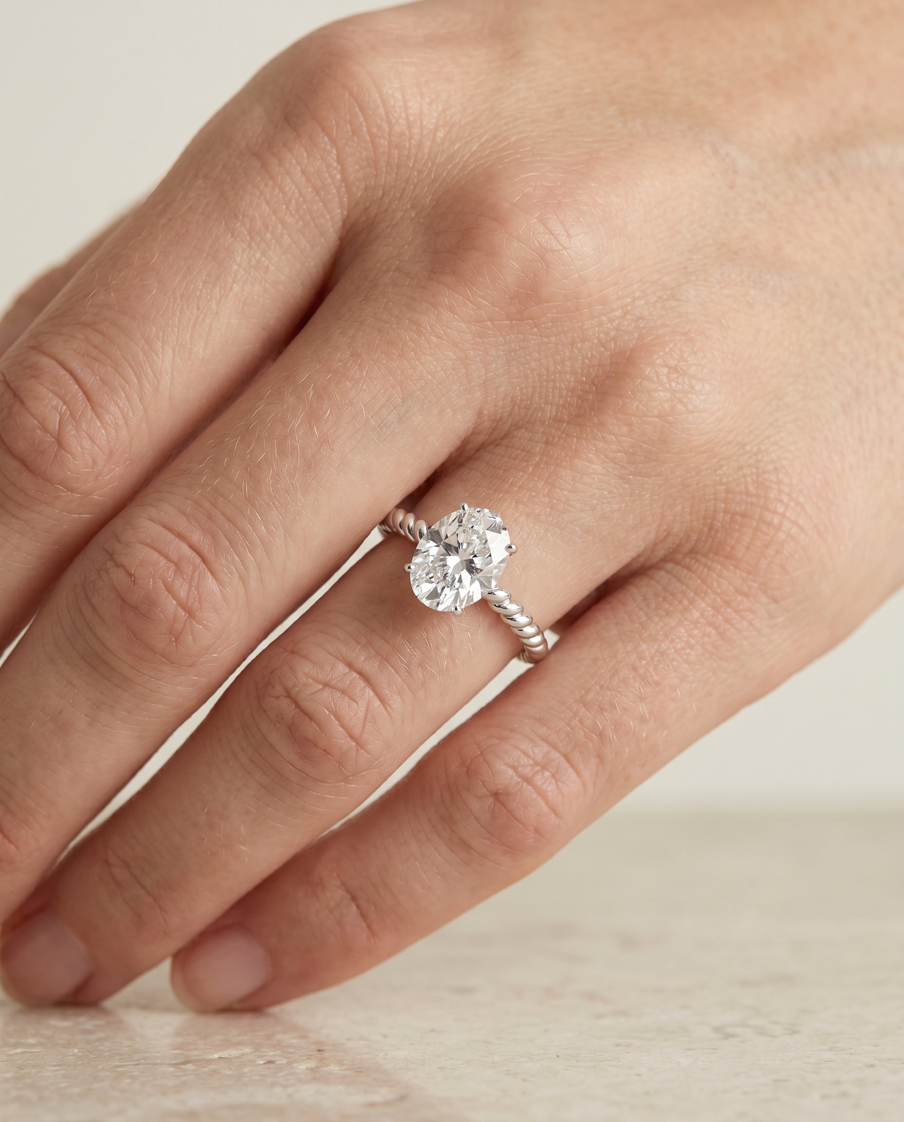 The Charlie engagement ring setting in Platinum, twisted rope surprise diamond solitaire design | RockHer