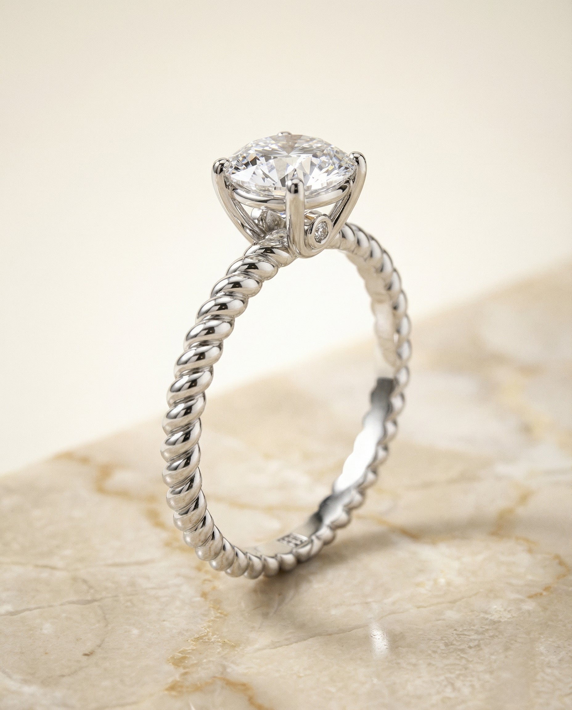 Twisted Rope Surprise Diamond Solitaire styling on The Charlie round engagement ring setting | RockHer