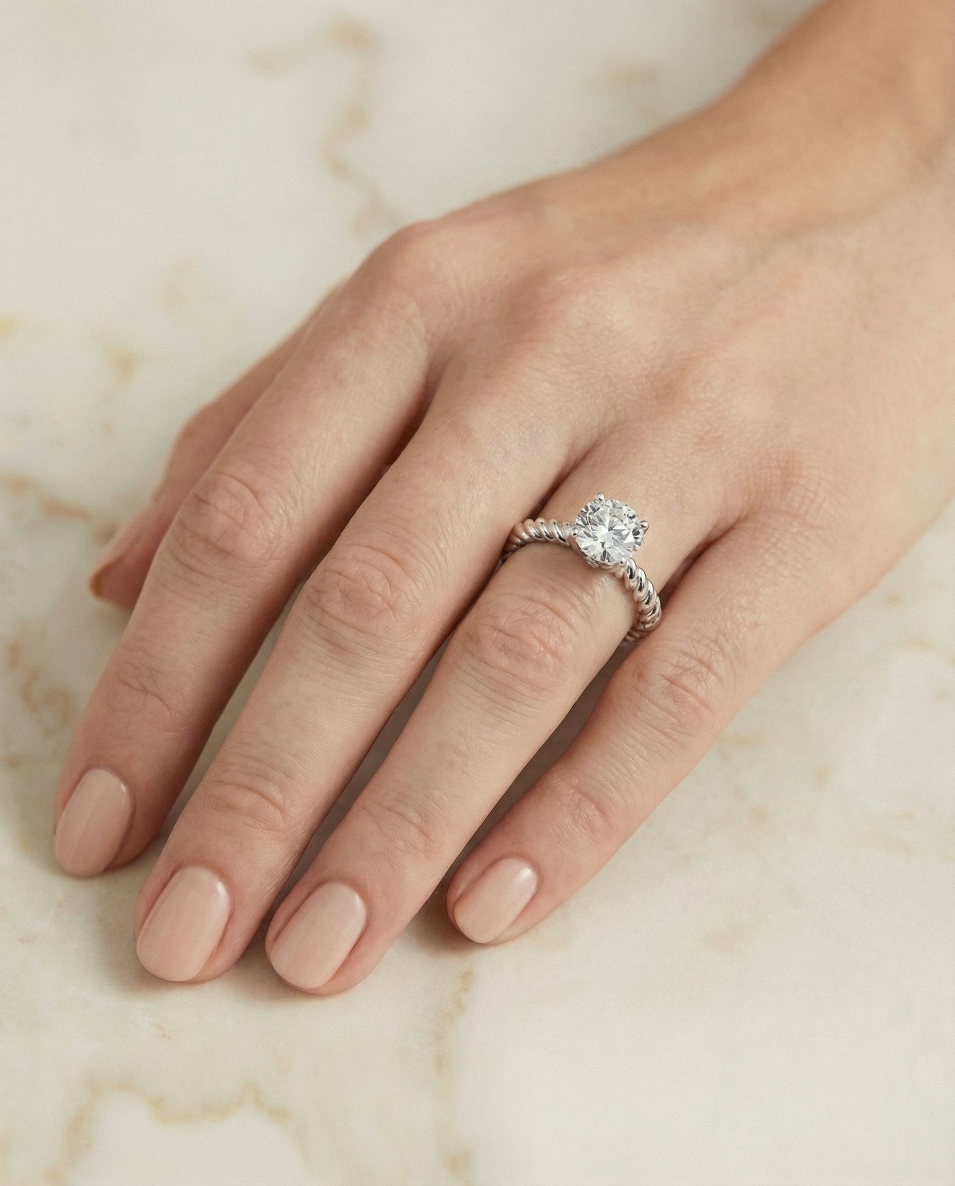 The Charlie setting for round diamonds, made to order in Platinum | RockHer