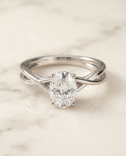 The Blondie Twisted Hidden Halo Solitaire Engagement Ring Setting for Oval Diamonds in Platinum | RockHer