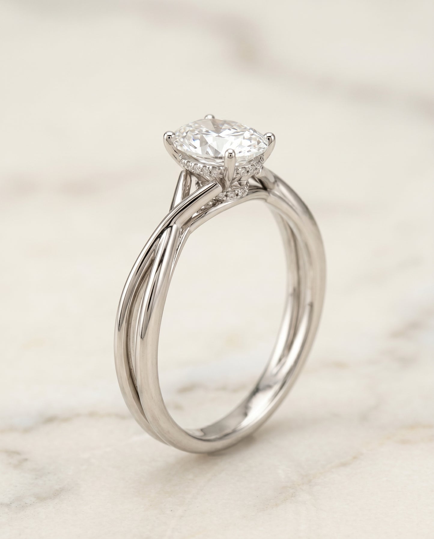 The Blondie Solitaire Engagement Ring Setting for Oval Diamonds in Platinum