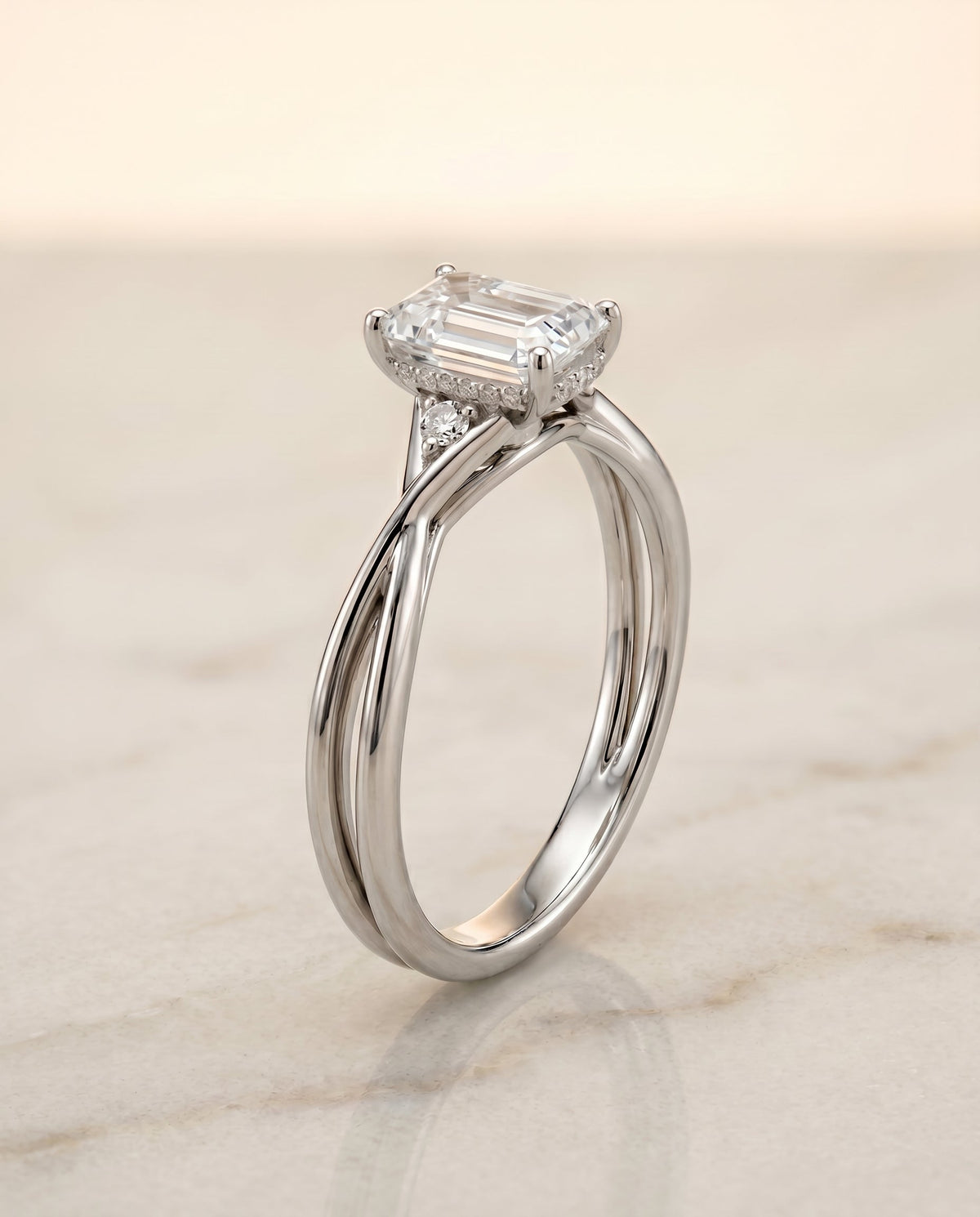 The Dusty Select Twisted Shank Hidden Halo Solitaire Emerald Cut Engagement Ring with Lab Diamond in Platinum, view 1