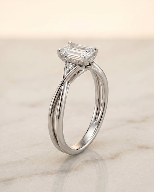 The Dusty Select Twisted Shank Hidden Halo Solitaire Emerald Cut Engagement Ring with Lab Diamond in Platinum — view 1