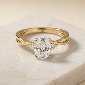 The Dusty Hidden Halo Solitaire Oval Engagement Ring Setting in 18K Yellow Gold