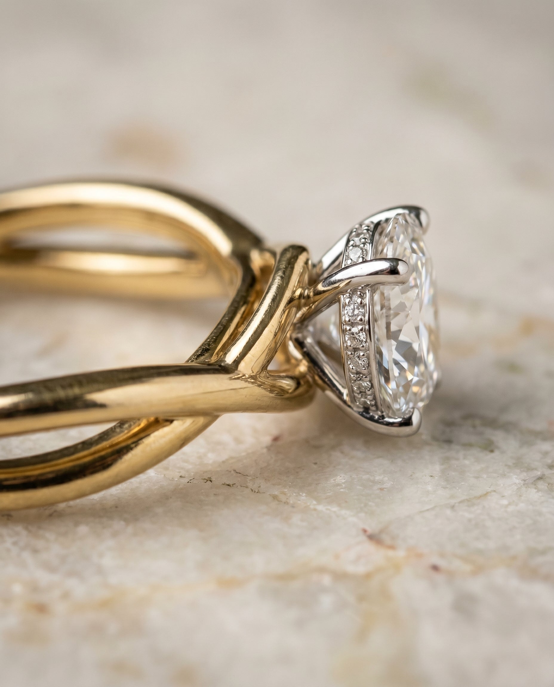 Grace Select Twisted Shank Hidden Halo Solitaire Oval Lab Diamond Engagement Ring in 18K Yellow Gold, detail view | RockHer