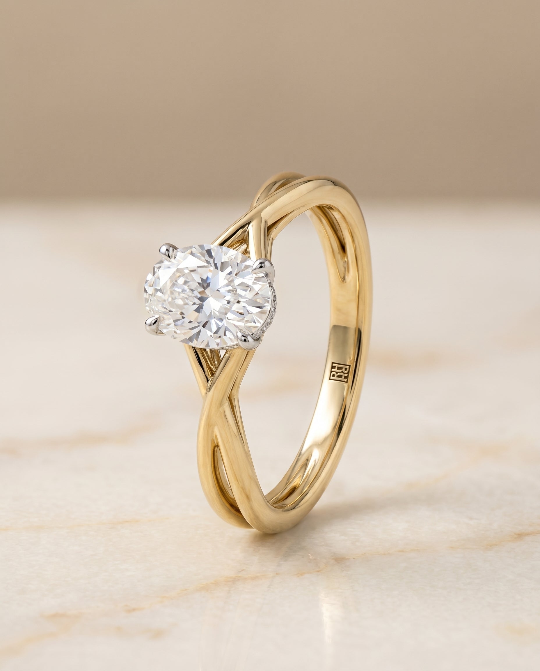 Twisted Shank Hidden Halo Solitaire styling on The Grace oval engagement ring setting | RockHer