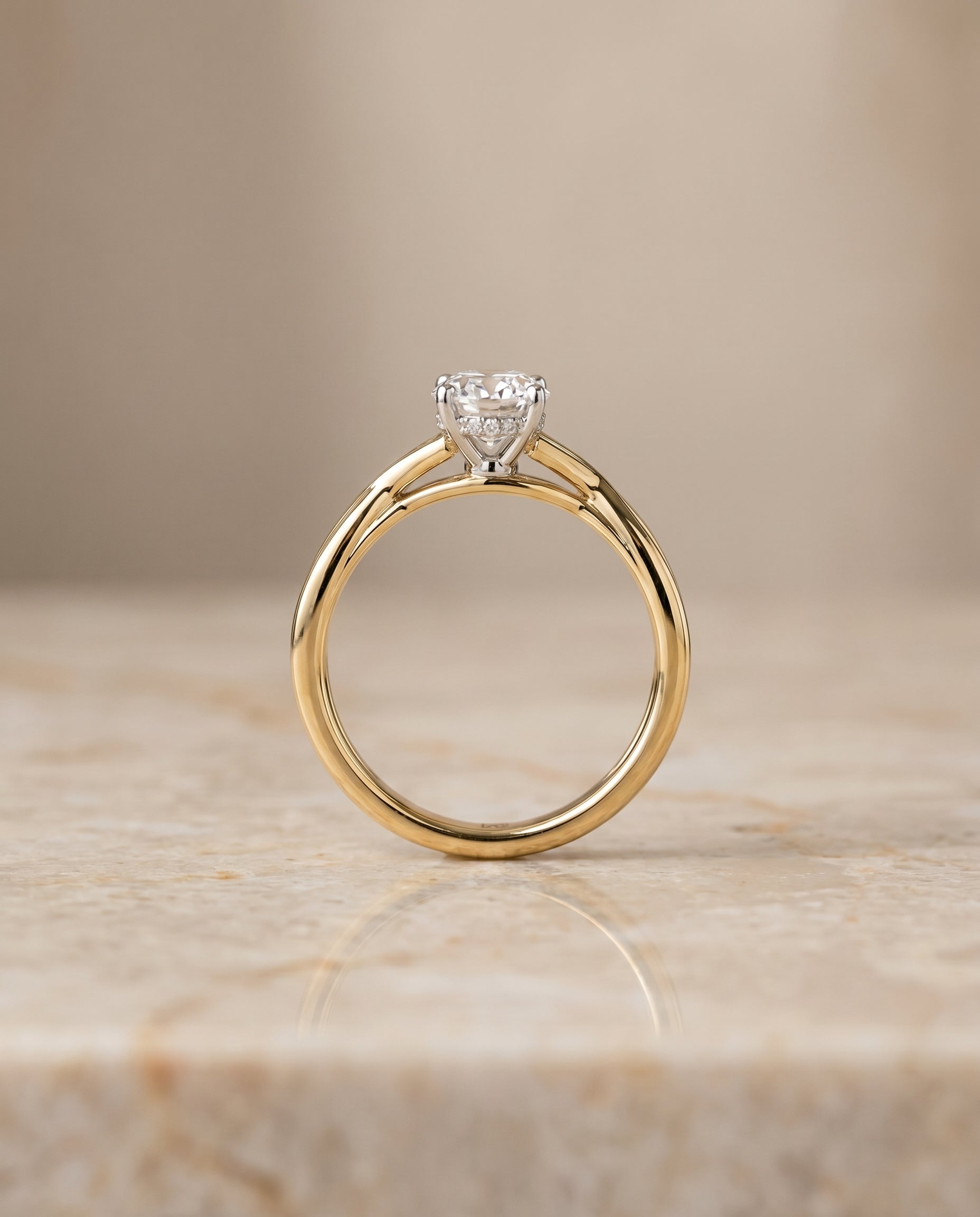 The Grace twisted shank hidden halo solitaire engagement ring setting, shown in 18K Yellow Gold | RockHer