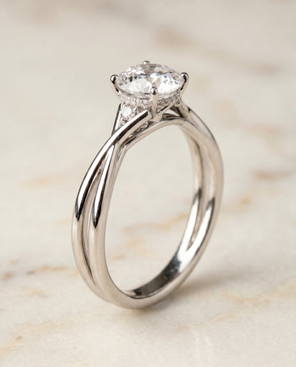 The Dusty Hidden Halo Solitaire Round Engagement Ring Setting in Platinum