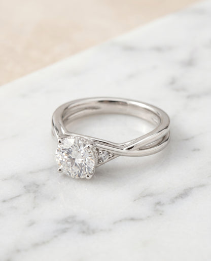 The Dusty Twisted Hidden Halo Solitaire Engagement Ring Setting for Round Diamonds in Platinum | RockHer