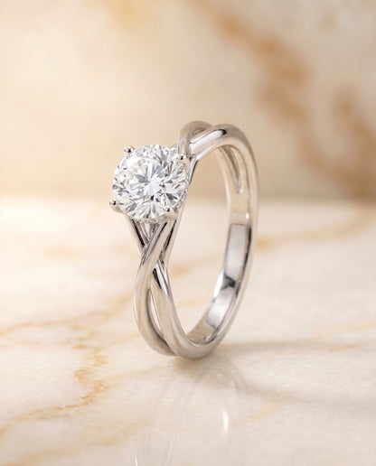 The Grace Twisted Hidden Halo Solitaire Engagement Ring Setting for Round Diamonds in 18K White Gold | RockHer