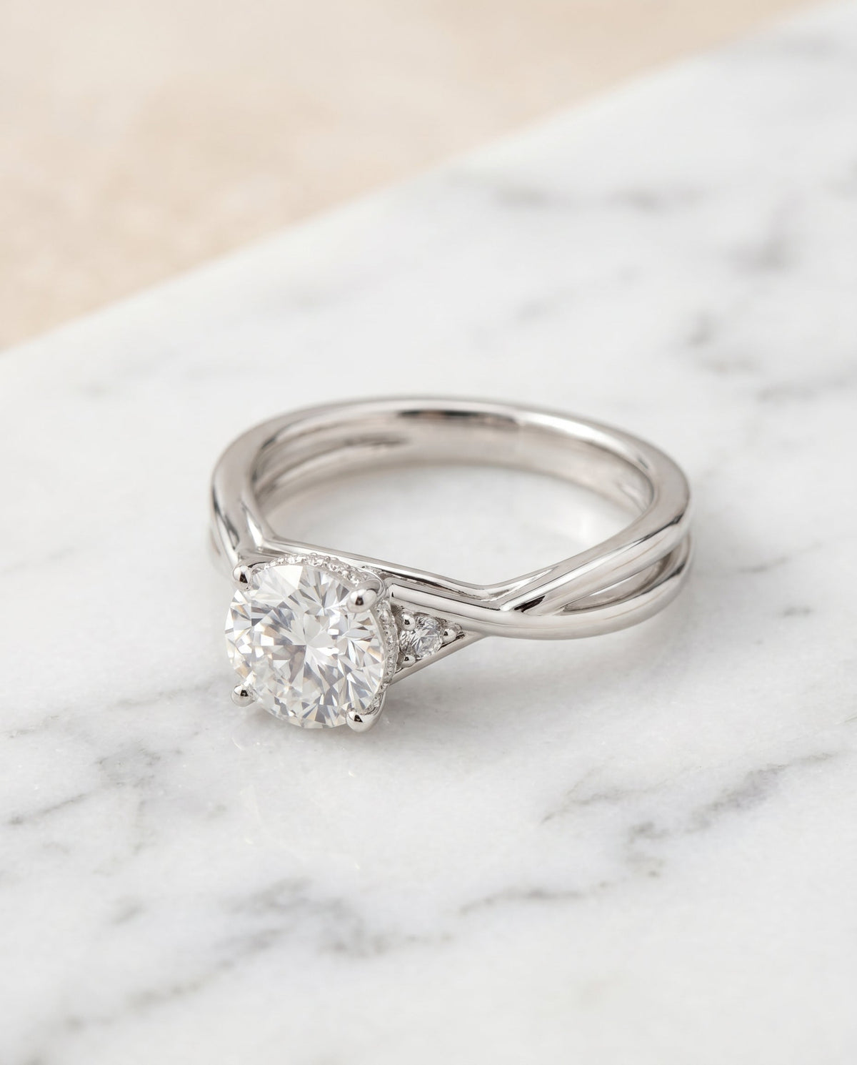 Dusty Select Hidden Halo Solitaire Round Lab Diamond Engagement Ring in Platinum, shown on hand, angled | RockHer