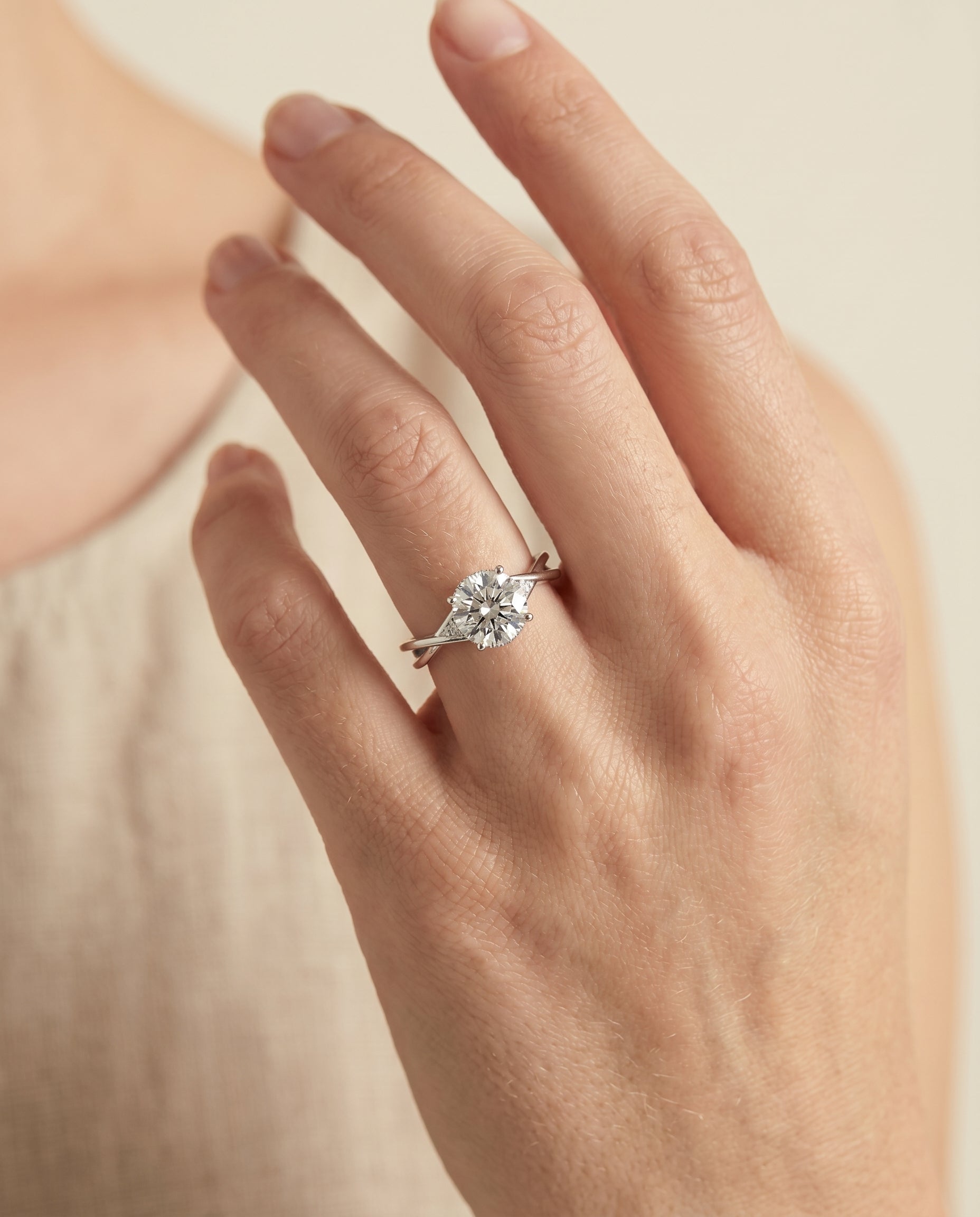 The Dusty engagement ring setting in Platinum, hidden halo solitaire design | RockHer