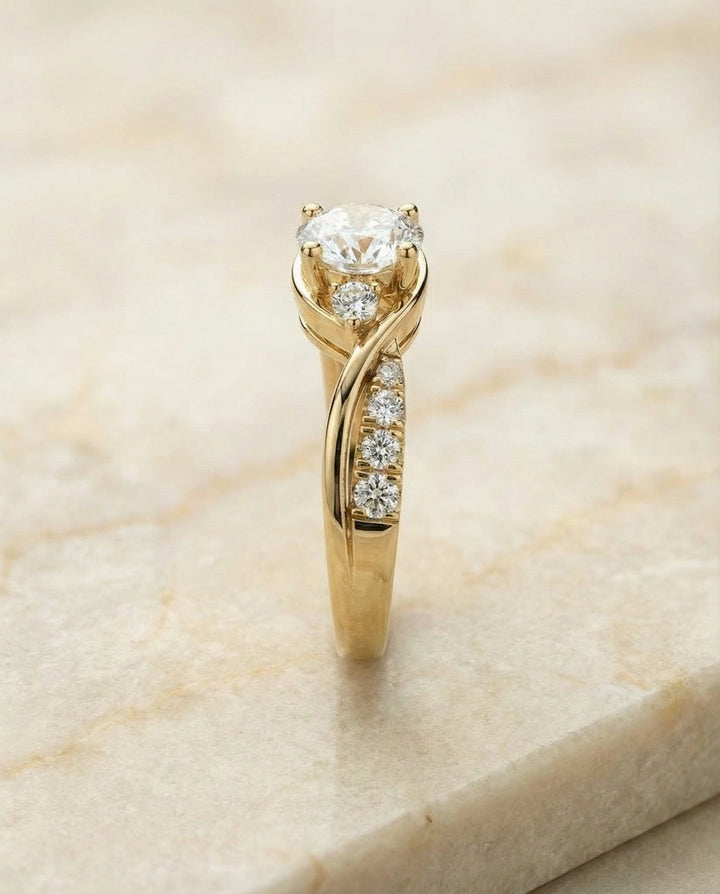 Round Brilliant, Twisted Three Stone, in 18K Yellow Gold – side profile | RockHer