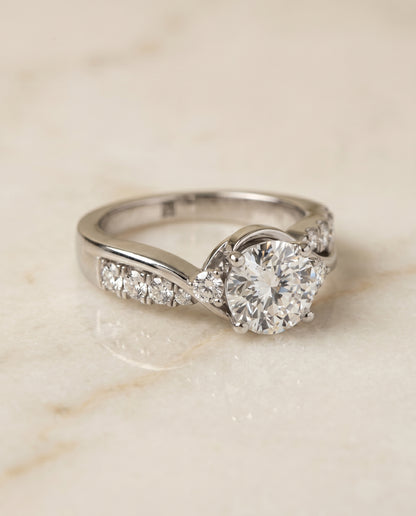 Round Brilliant, Twisted Three Stone, in 18K White Gold – angled view | RockHer