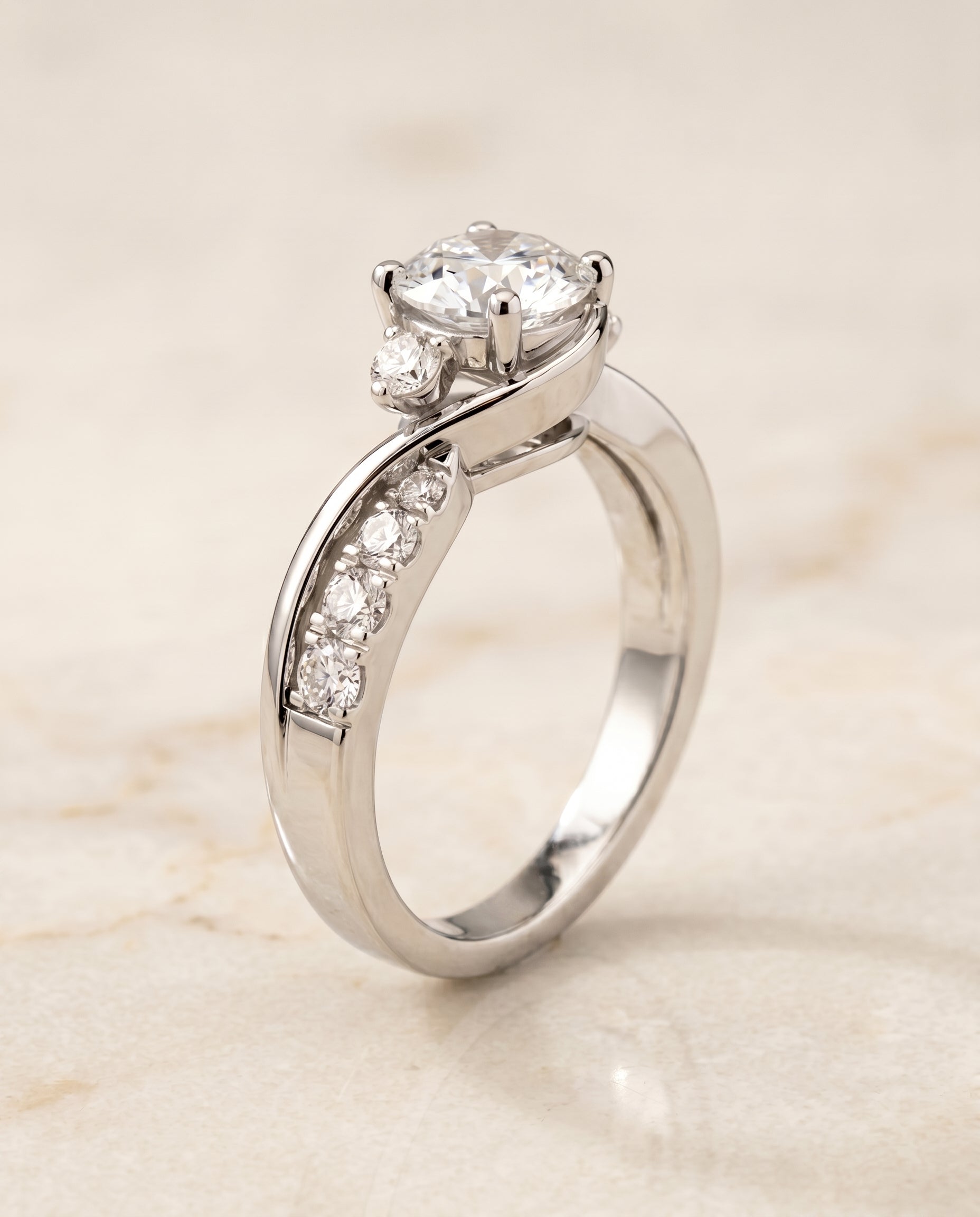 Twisted Three Stone styling on The Alice round engagement ring setting | RockHer