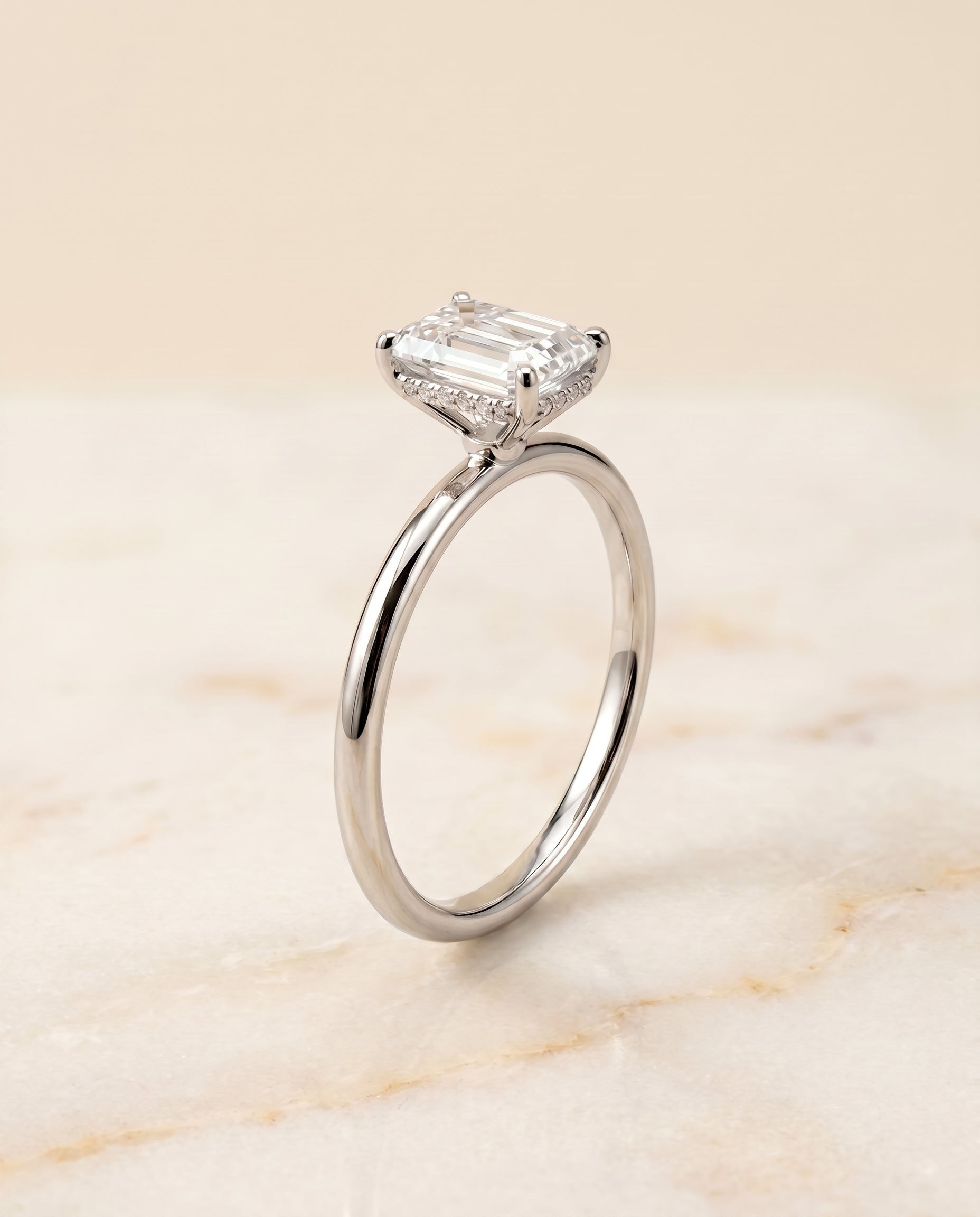 Upper Hidden Halo Solitaire Cut styling on The Eartha emerald engagement ring setting | RockHer