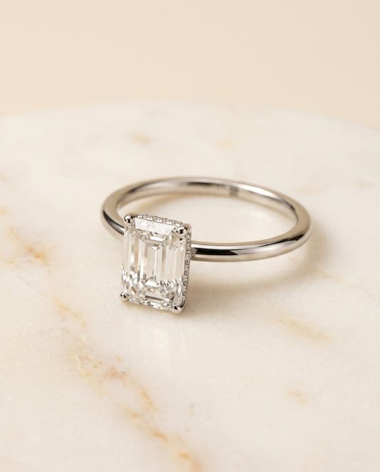 The Eartha Select Upper Hidden Halo Solitaire Emerald Cut Engagement Ring with Lab Diamond in Platinum — view 1