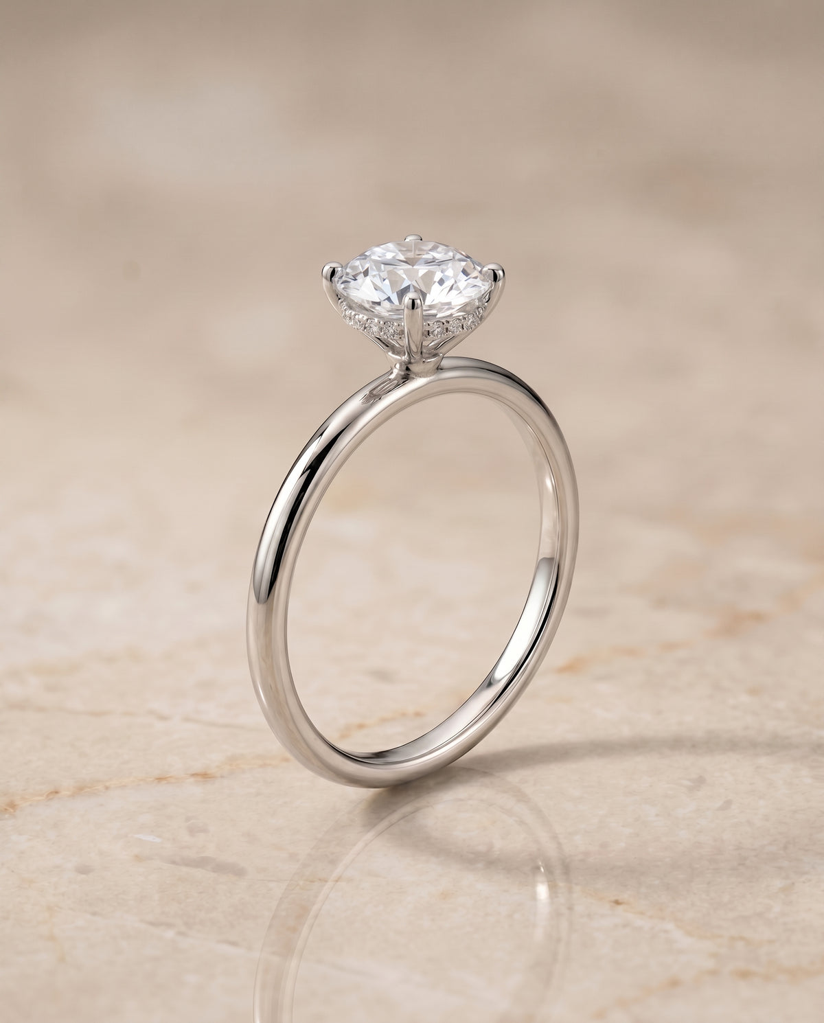 The Eartha upper hidden halo solitaire engagement ring setting, shown in Platinum | RockHer