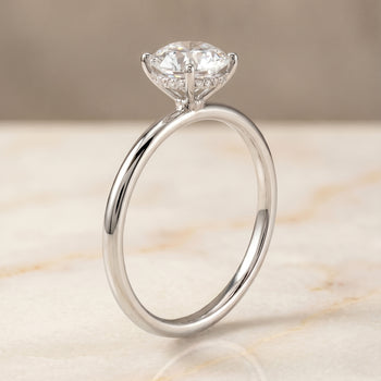 The Eartha Upper Hidden Halo Solitaire Round Engagement Ring Setting in Platinum