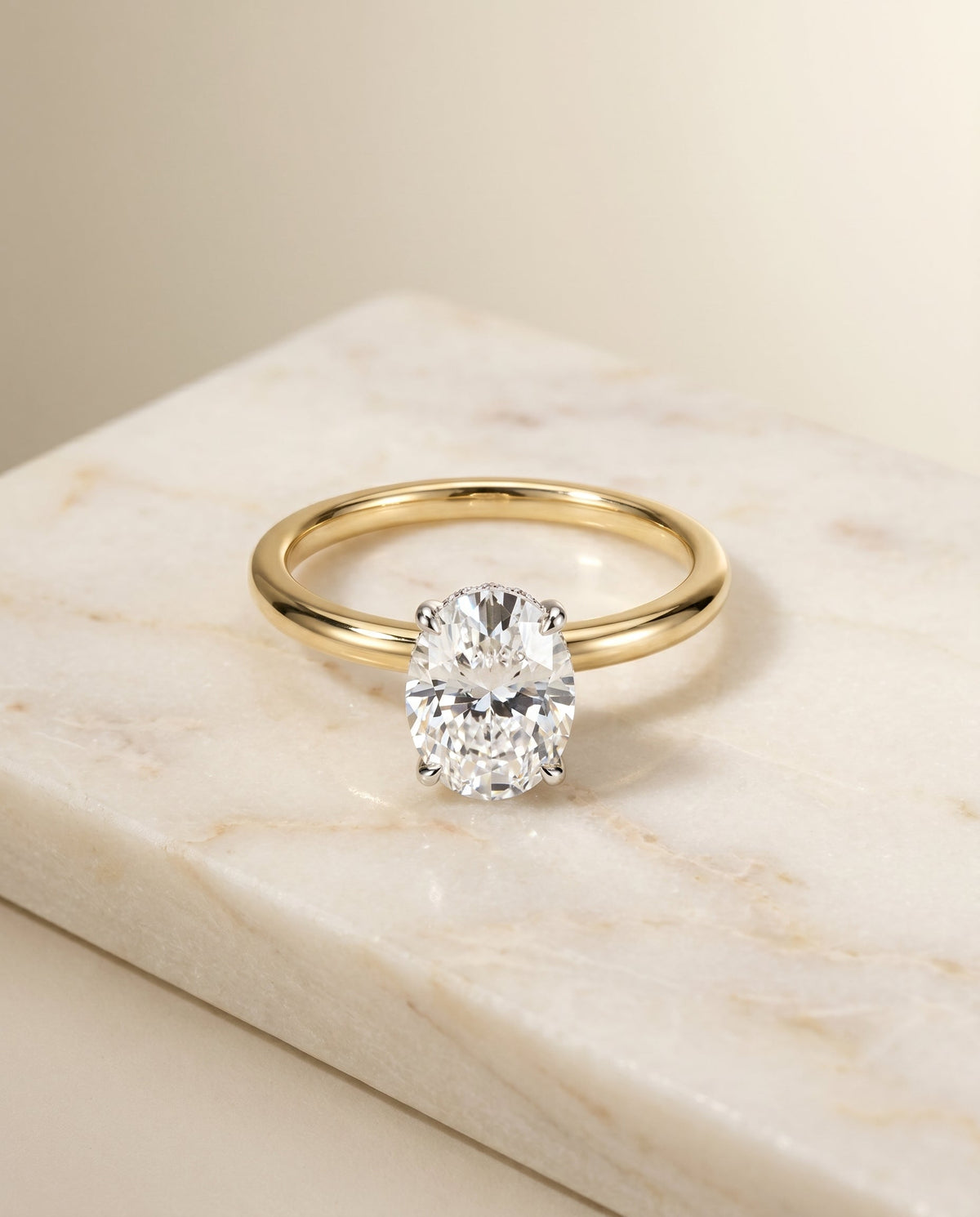 Eartha Select Upper Hidden Halo Solitaire Oval Lab Diamond Engagement Ring in 18K Yellow Gold, alternate angle | RockHer