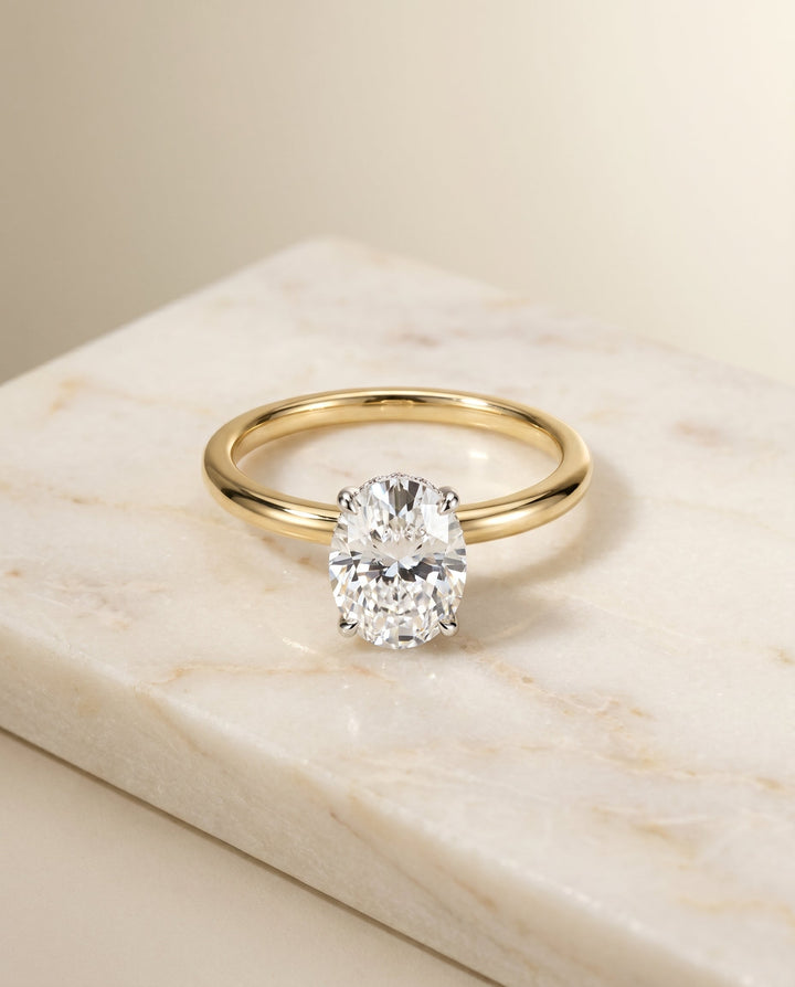 Eartha Select Upper Hidden Halo Solitaire Oval Lab Diamond Engagement Ring in 14K Yellow Gold, alternate angle | RockHer