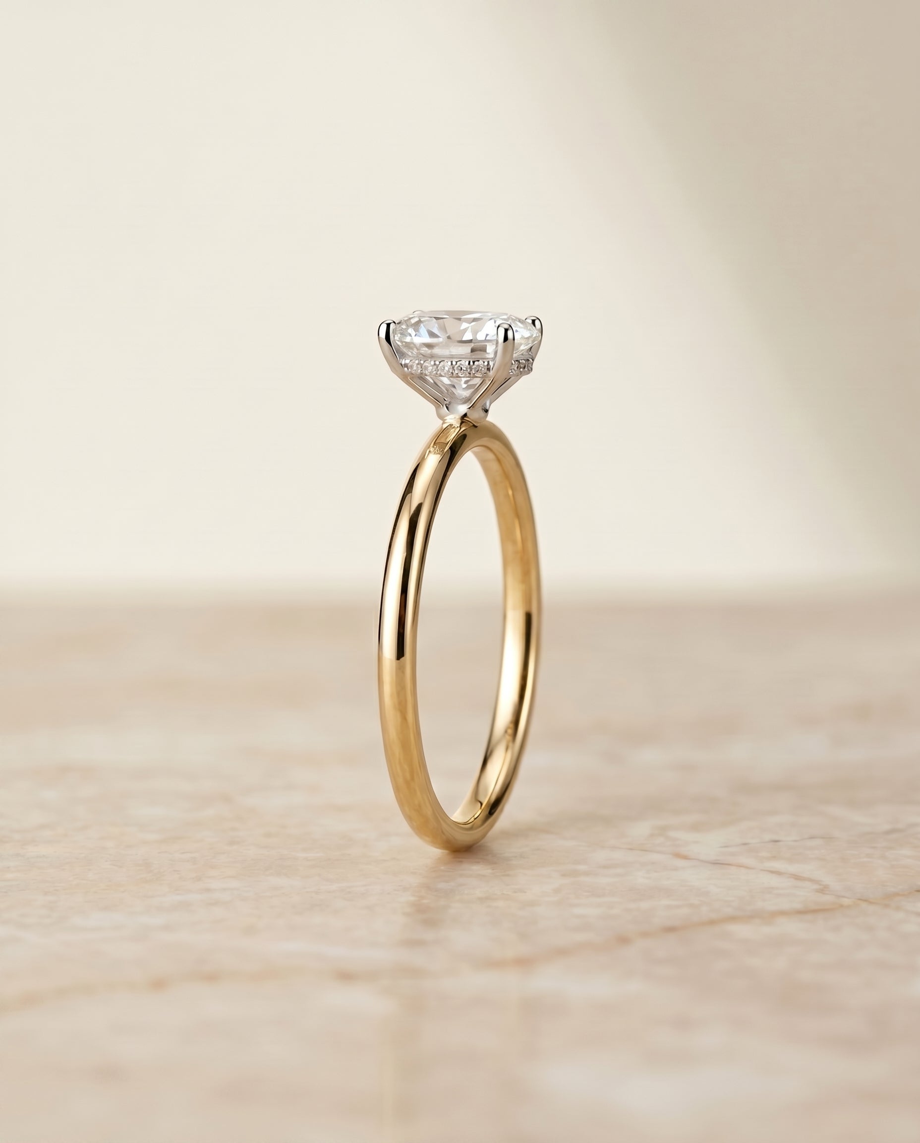 The Eartha upper hidden halo solitaire engagement ring setting, shown in 18K Yellow Gold | RockHer