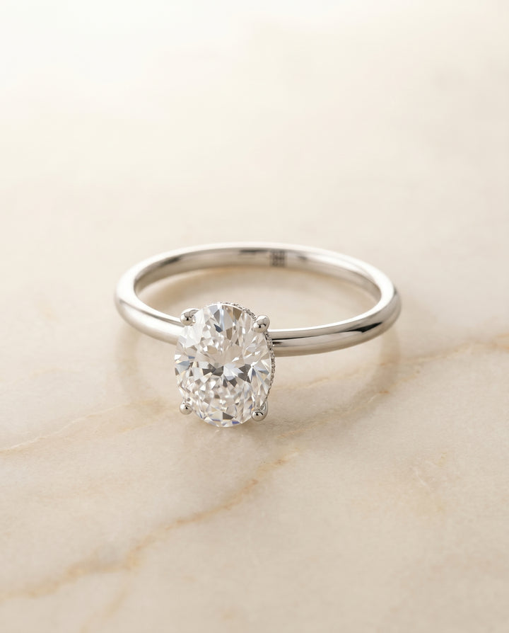 The Eartha Hidden Halo Solitaire Engagement Ring Setting for Oval Diamonds in Platinum | RockHer