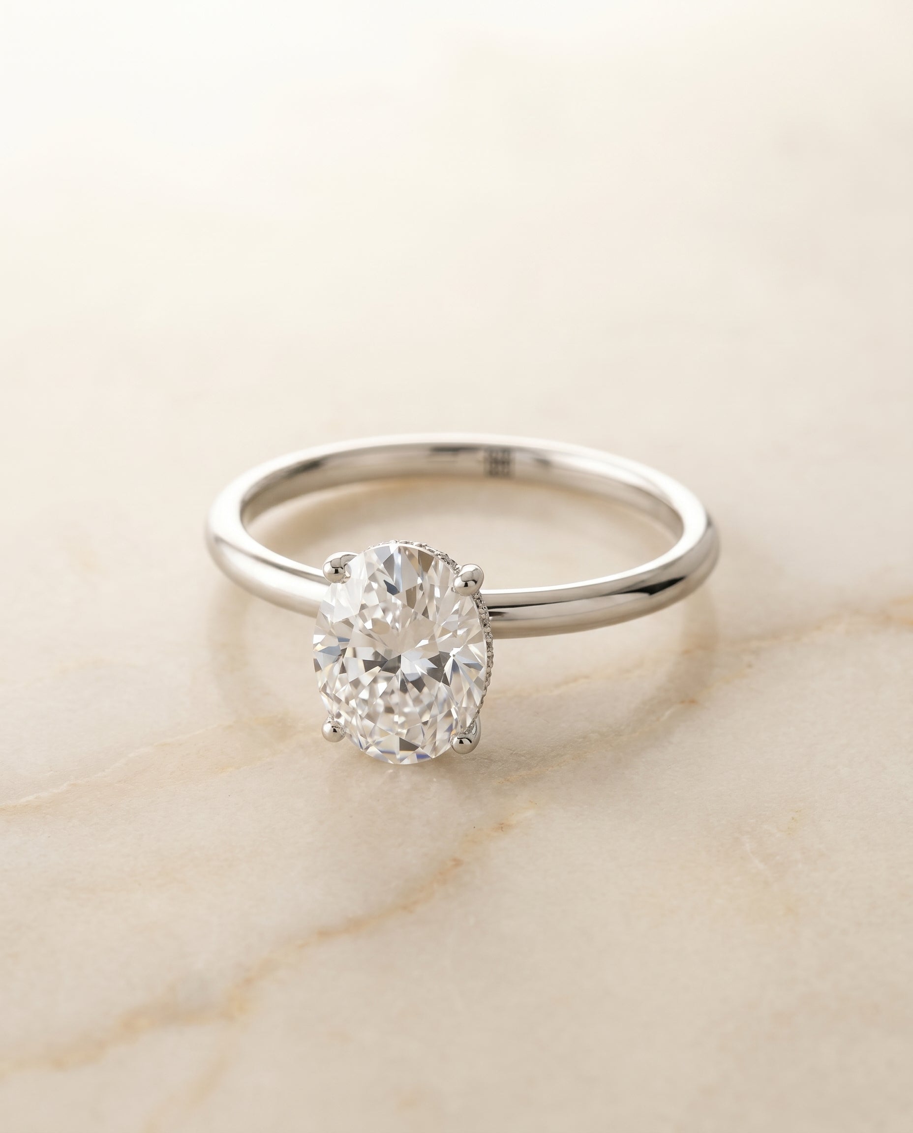 Eartha Select Upper Hidden Halo Solitaire Oval Lab Diamond Engagement Ring in Platinum, alternate angle | RockHer