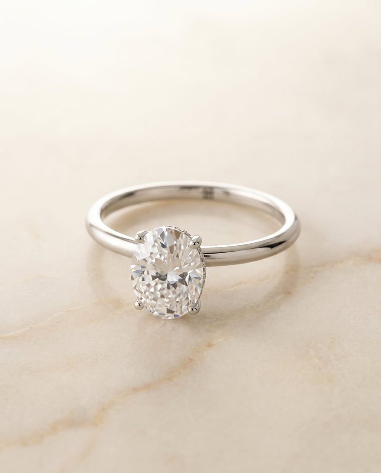 The Eartha Select Upper Hidden Halo Solitaire Oval Lab Diamond Engagement Ring in Platinum