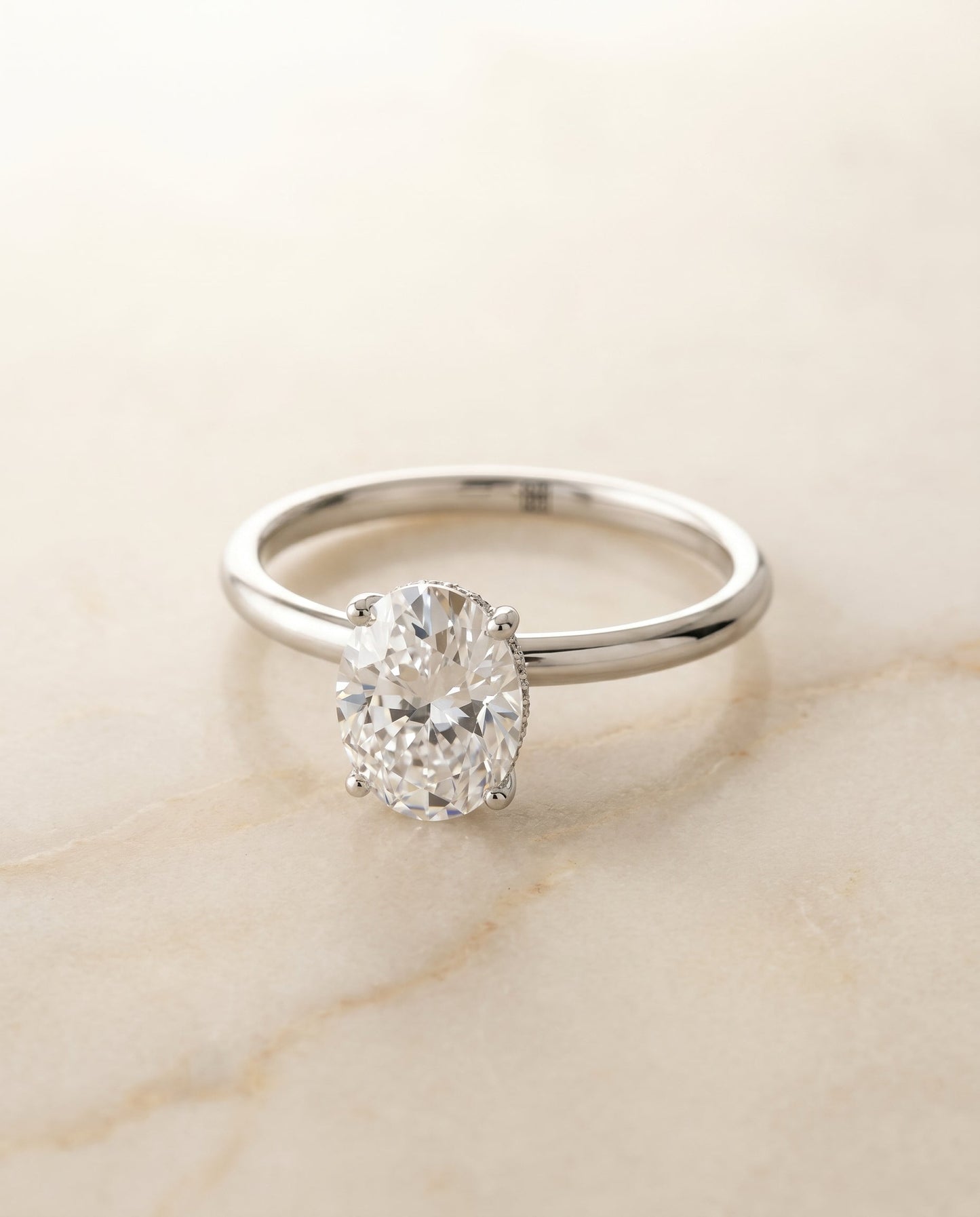Eartha Select Upper Hidden Halo Solitaire Oval Lab Diamond Engagement Ring in 14K White Gold, alternate angle | RockHer