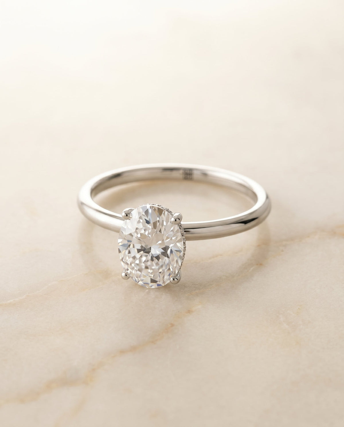 Eartha Select Upper Hidden Halo Solitaire Oval Lab Diamond Engagement Ring in 18K White Gold, alternate angle | RockHer