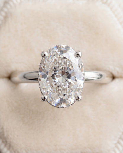 The Eartha Upper Hidden Halo Solitaire Oval Engagement Ring Setting in 18K White Gold