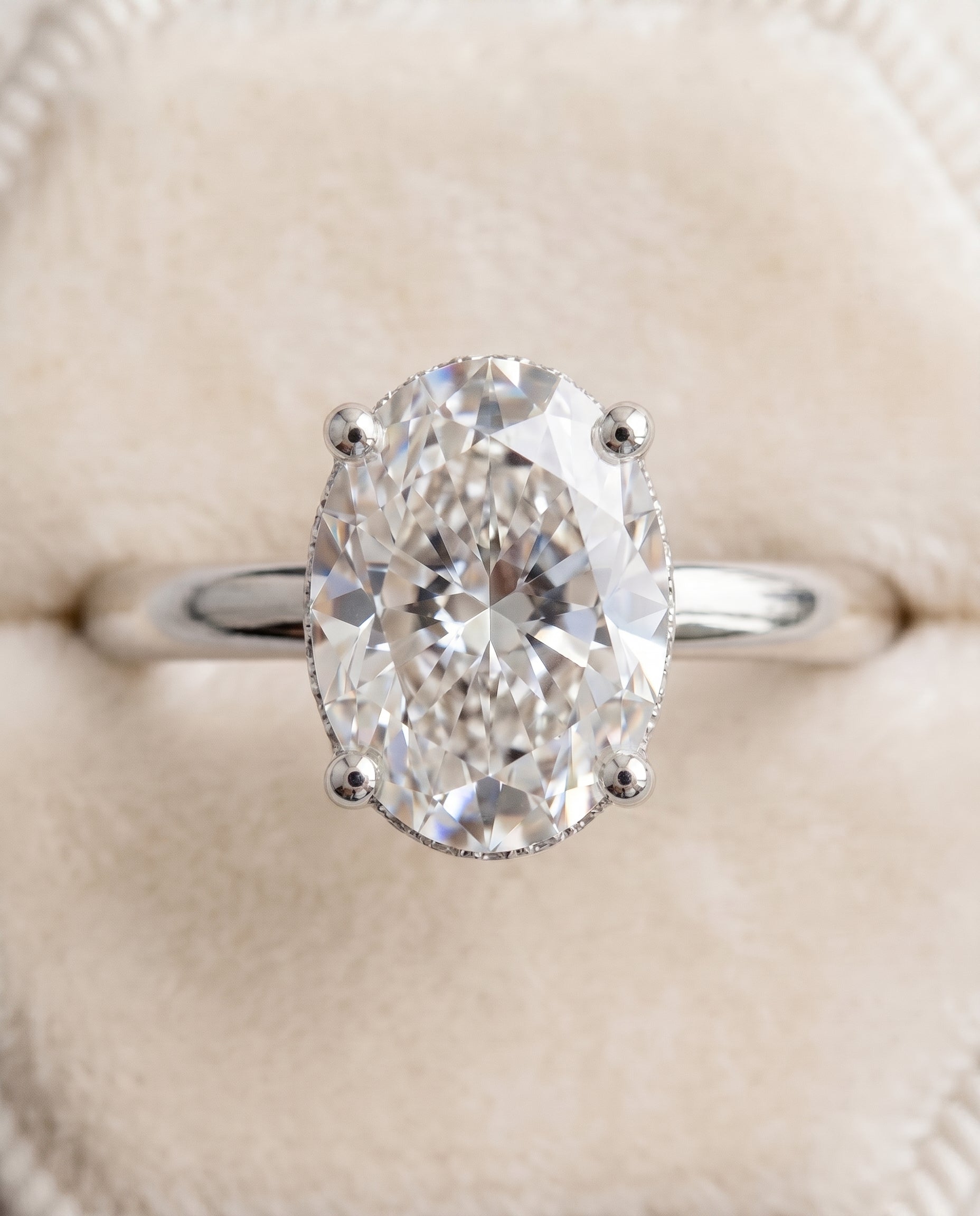 Eartha Select Upper Hidden Halo Solitaire Oval Lab Diamond Engagement Ring in Platinum, detail view | RockHer