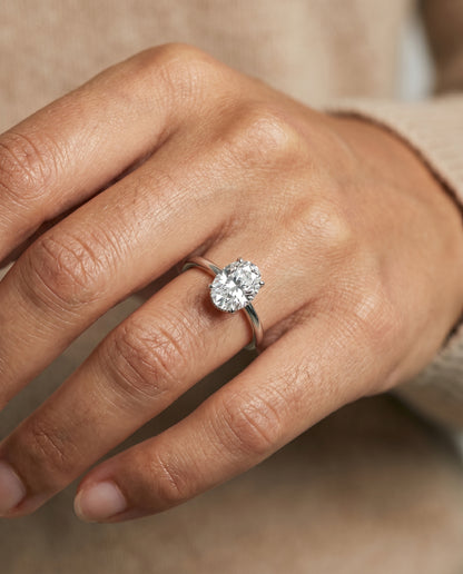 The Eartha Upper Hidden Halo Solitaire Oval Engagement Ring Setting in 18K White Gold
