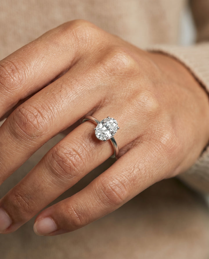 The Eartha Hidden Halo Engagement Ring Setting for Oval Diamonds in 18K White Gold