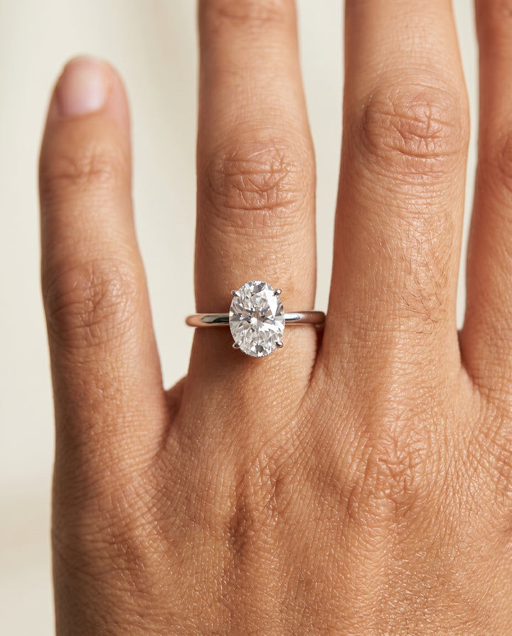 The Eartha Hidden Halo Engagement Ring Setting for Oval Diamonds in 18K White Gold