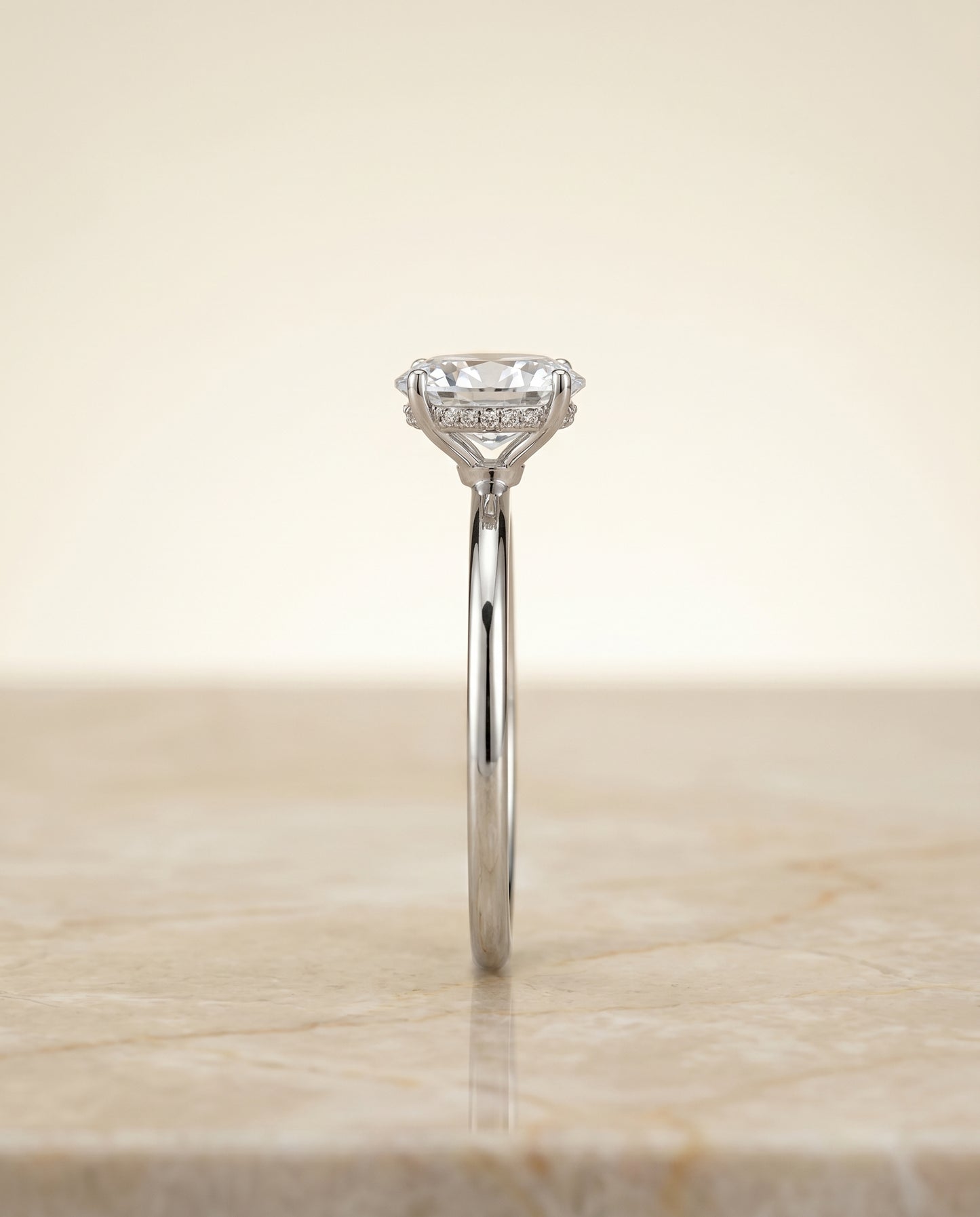 The Eartha Hidden Halo Engagement Ring Setting for Oval Diamonds in 18K White Gold