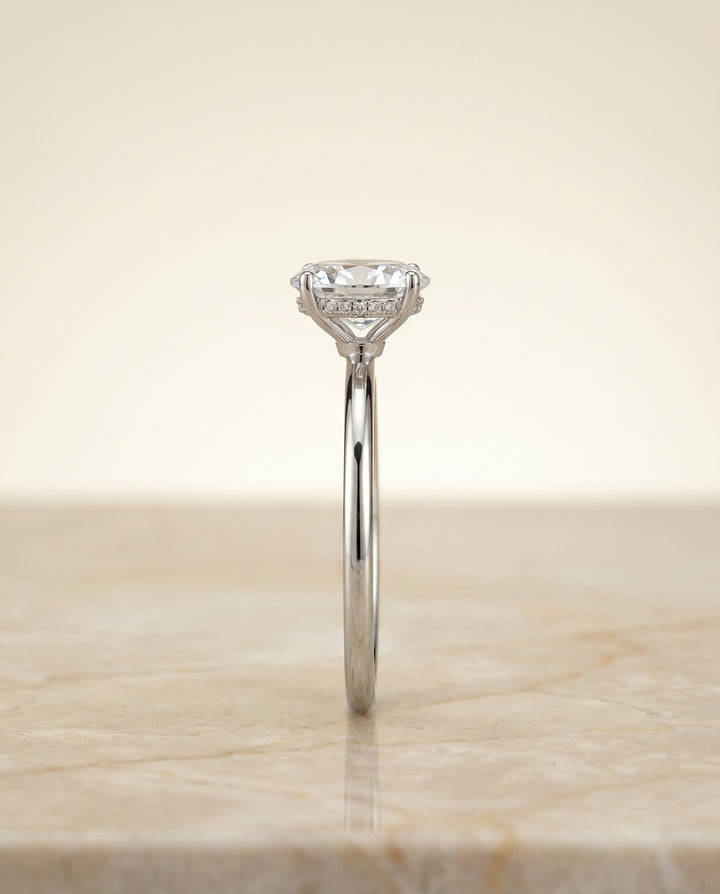 The Eartha Hidden Halo Engagement Ring Setting for Oval Diamonds in 18K White Gold