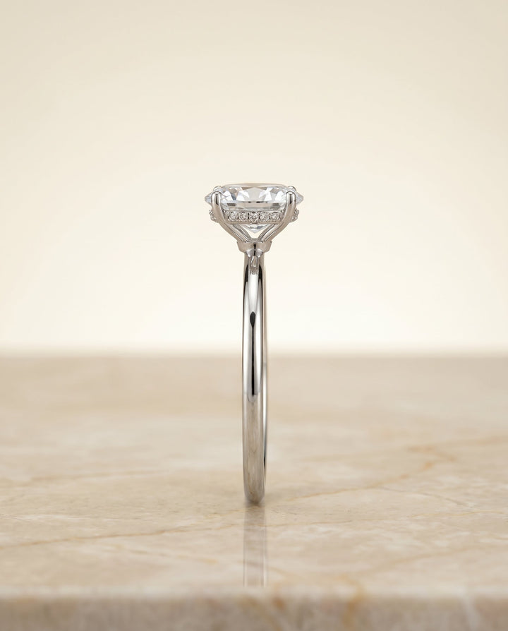 Eartha Select Upper Hidden Halo Solitaire Oval Lab Diamond Engagement Ring in Platinum, side view | RockHer