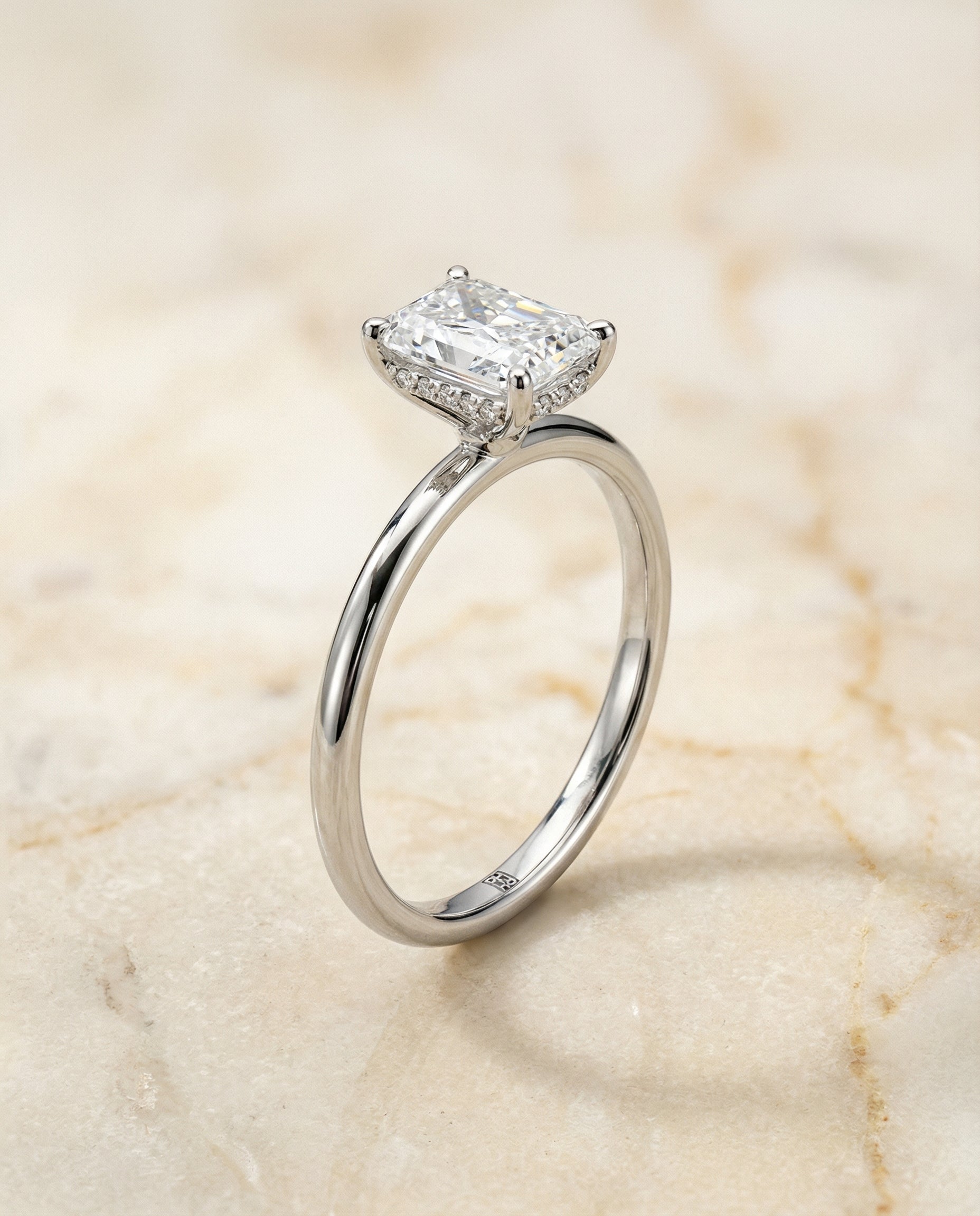 The Eartha engagement ring setting in 18K White Gold, upper hidden halo solitaire cut design | RockHer