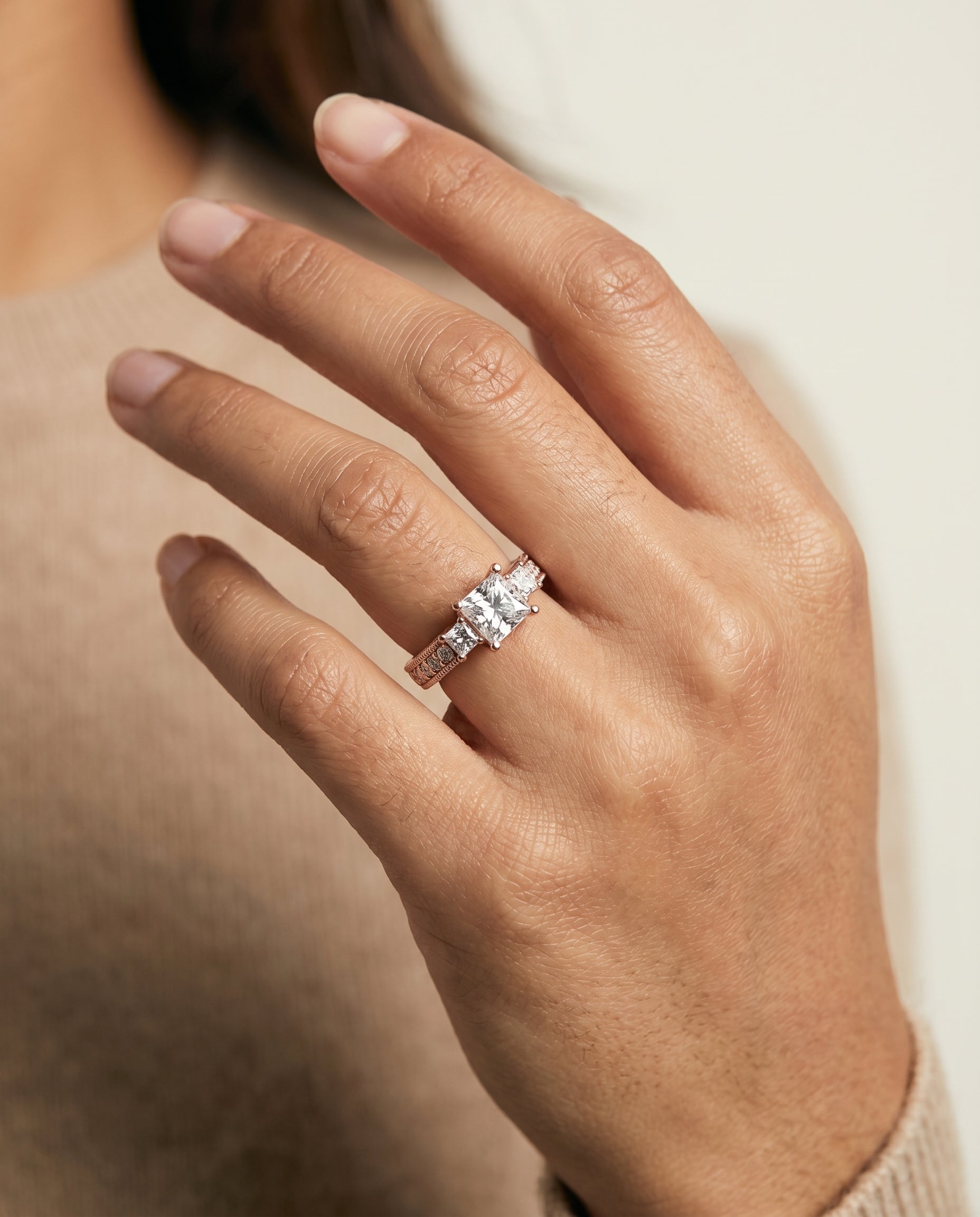 Helena Select Vintage Three Stone Princess Cut Lab Diamond Engagement Ring in 14K Rose Gold, shown on hand | RockHer